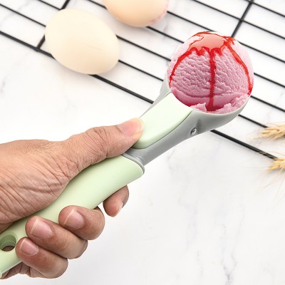 Anti-freeze plastic ice cream spoon scoop with easy release TRP touch grip handle